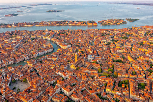 Aerial shot of Venice, Santa Croce, Italy. Tiled roofs and streets. Historical buildings. Tourism. photo