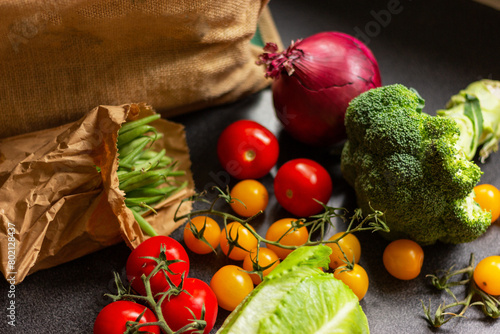 vegetables and shopping bag in kitchen table, healthy food background