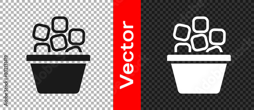 Black Ice bucket filled with ice cubes icon isolated on transparent background. Vector