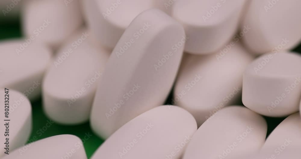 a large number of white tablets for the treatment of diseases, white tablets in close-up a large number of white tablets for the treatment of diseases, white tablets in close-up