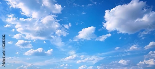 Scattered Clouds in a Vibrant Blue Sky.