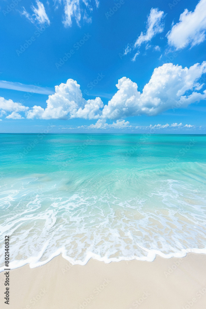 A beautiful blue ocean with white clouds in the sky