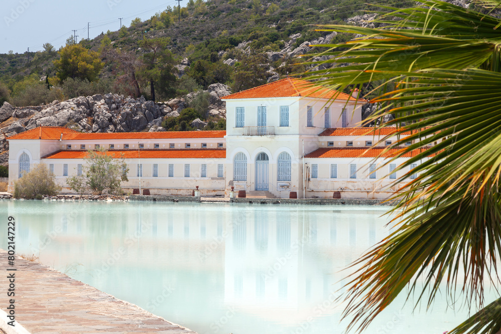 The Spa building of early 1900s at the entrance of Methana town, Greece, with the rich, sulphur hot waters, colored milk white, with distinctive (rather unpleasant) smell.