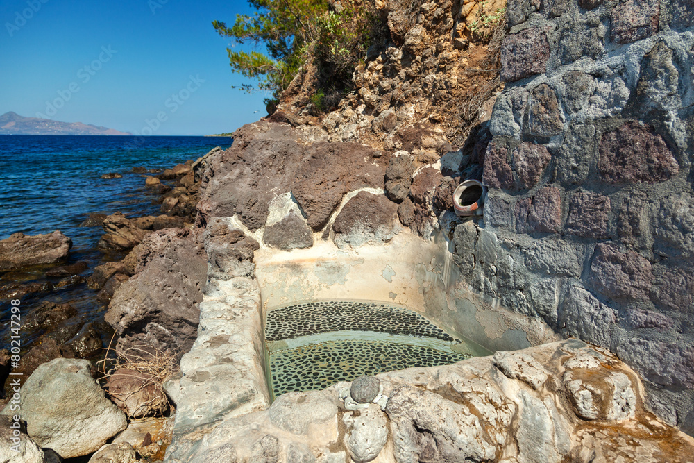 The so-called Baths of Pausanias in Methana, Greece, feature a small pool that fills up every 15 minutes for visitors seeking to enjoy hot waters at around 39°C.