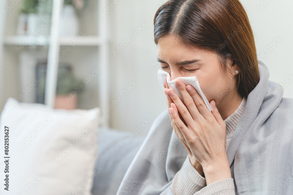 Female unhealthy Sickness, asian young woman, girl unwell and coughing, have cold, sore throat isolated white background suffering with symptom cough feeling bad. Healthcare of Coronavirus, covid-19. Female unhealthy Sickness, asian young woman, girl unwell and coughing, have cold, sore throat isolated white background suffering with symptom cough feeling bad. Healthcare of Coronavirus, covid-19.