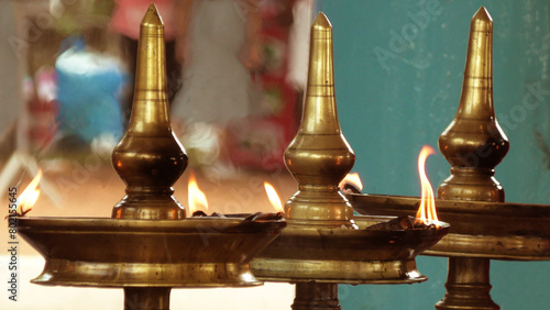 Special divine oil lamp arrangement for auspicious ceremonies in Kerala, India	 photo