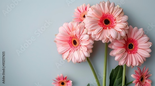 A bouquet of vibrant flowers in a unique vase stands out against the backdrop with a peek of the stem adding a touch of whimsy  Generated by AI
