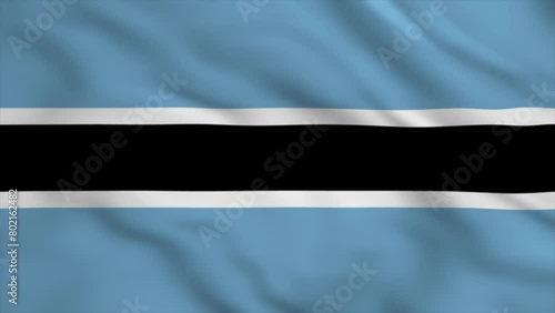 Detail of the national flag of Botswana waving in the wind on a clear day. Democracy and politics. Selective focus. Botswana is a landlocked country in Southern Africa. Seamless slow motion photo