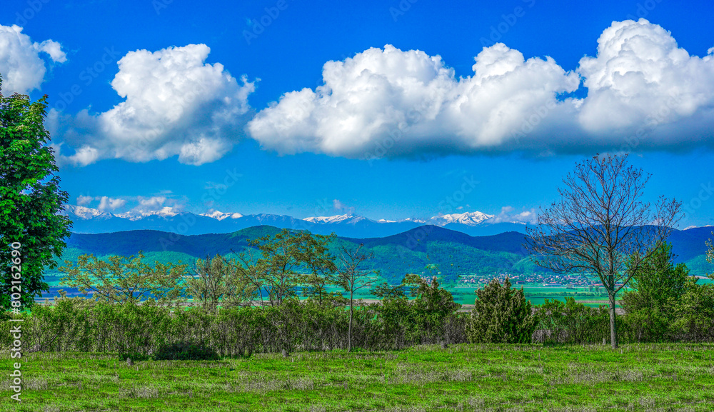 Panoramic view of the Rila Mountains from the Ihtiman field, Bulgaria. Panoramic view of the Rila Mountains from the Ihtiman field, Bulgaria.