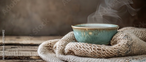 Close-up of a cup of steaming herbal tea, emphasis on warmth and comfort