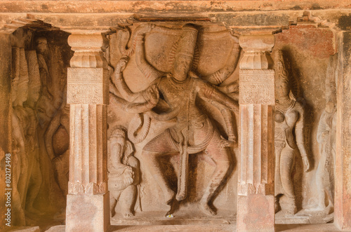 Sculpture or carving of dancing Shiva with Parvati and Saptamatrikas, Ravana padi Cave Temple Complex, Aihole, Badami, Karnataka, India. photo