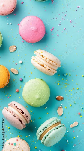 French cake macaron or macaroon on a turquoise background from above