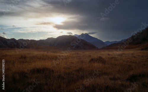 Distant views of the summits of Beinn Dearg Bheag and Beinn Dearg Mor from Badinaconair near the River Gruinard in the Scottish Highlands, Scotland in the UK.