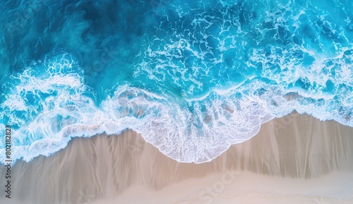 Fluid art paint of electric blue water waves crashing on sandy beach