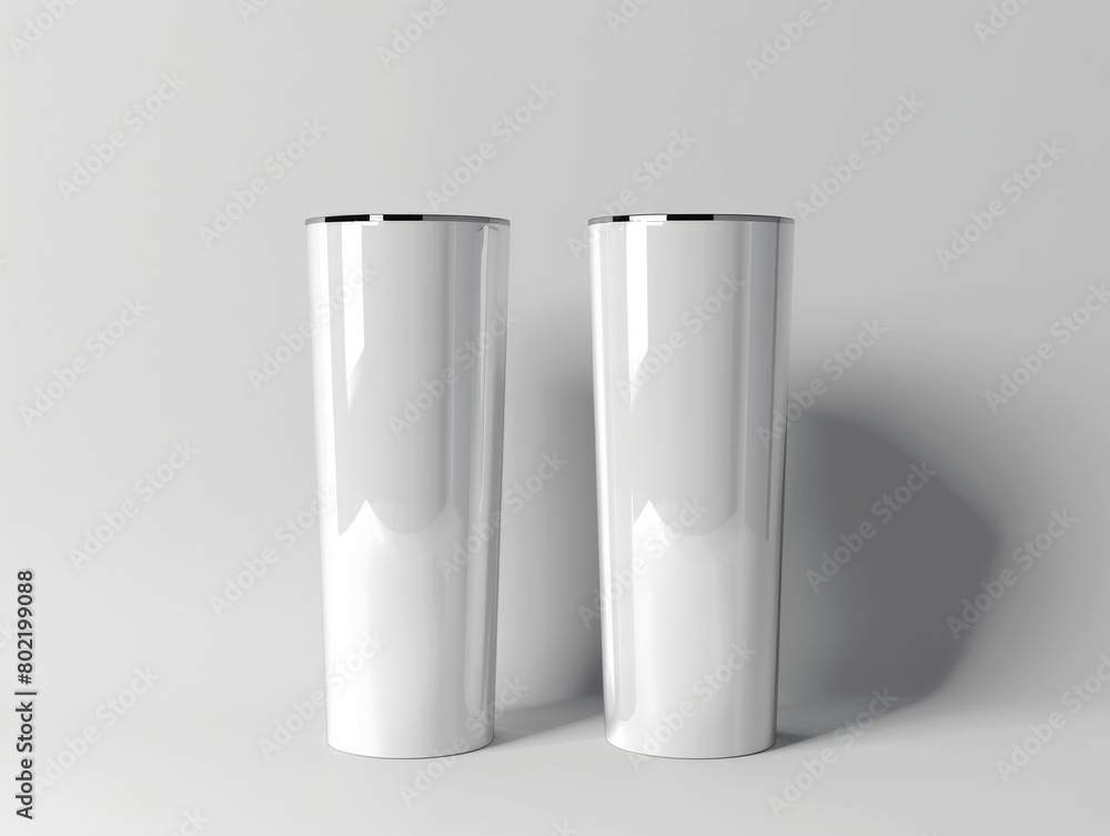 Elegant white tumbler mockups with a sleek design showcased on a minimalist background for branding purposes Elegant white tumbler mockups with a sleek design showcased on a minimalist background for branding purposes