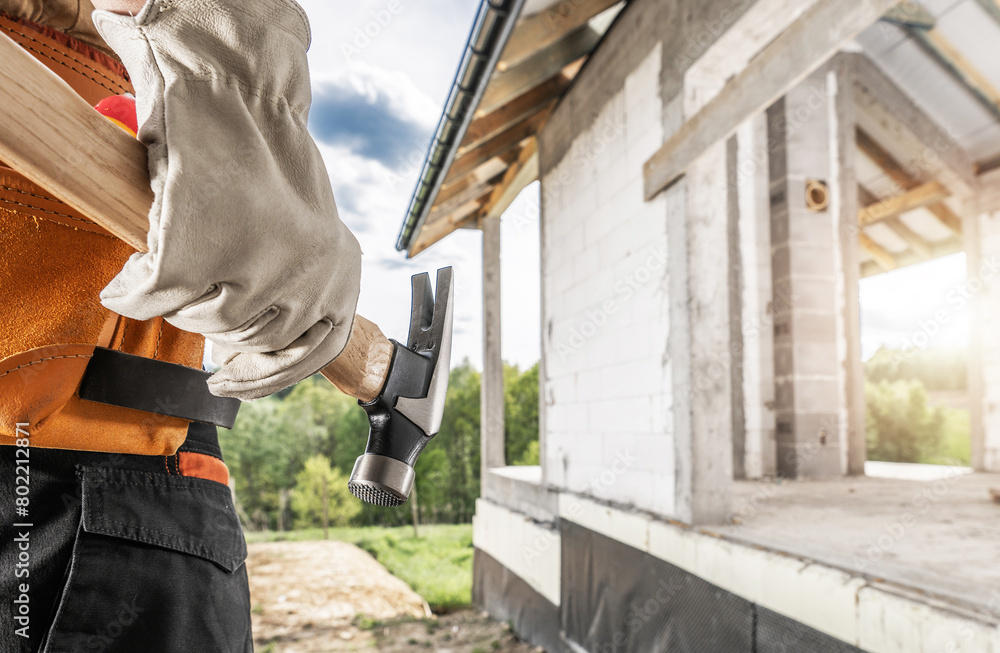 Construction Worker with a Hammer Tool in His Hand Construction Worker with a Hammer Tool in His Hand