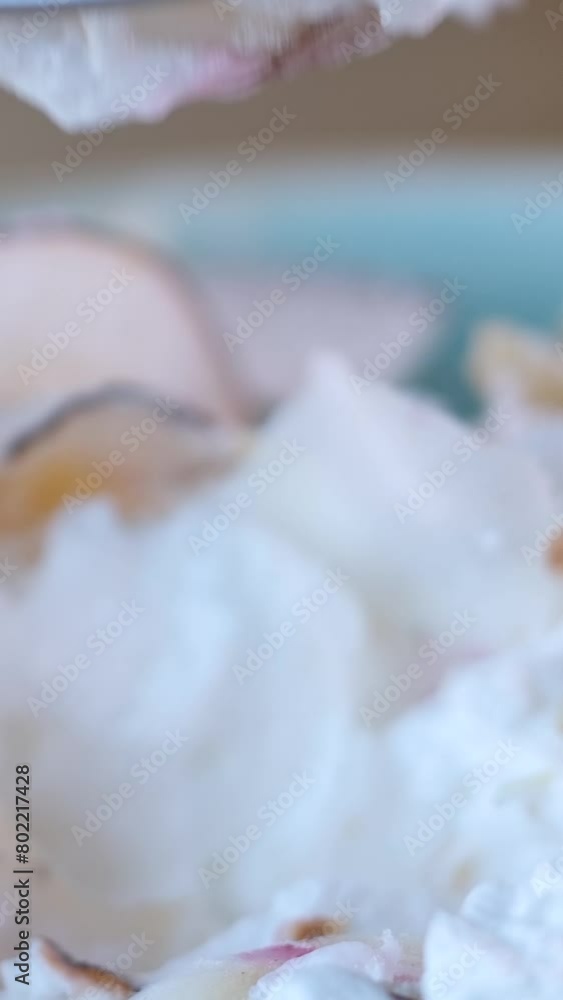 coconut flakes on egg whites. whipped deliciously with fork is dessert breakfast coconut flakes on egg whites. whipped deliciously with fork is dessert breakfast