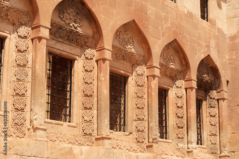 Row of barred windows in original ottoman architecture inside of the Ishak Pasha Palace, Sarayi, Dogubeyazit, Turkey