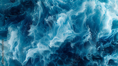 Design an AI-generated image that captures the essence of oceanic dynamism, with gradients shifting from azure to deep navy, portraying the eternal dance of waves rolling across the sea. photo