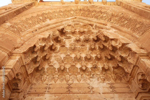Elaborate patterns and details carved into the ottoman entrance gate, doorway of the Ishak Pasha Palace, Sarayi, Dogubeyazit, Turkey photo
