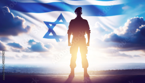 Silhouette of Soldier Against Israeli Flag at Sunset
