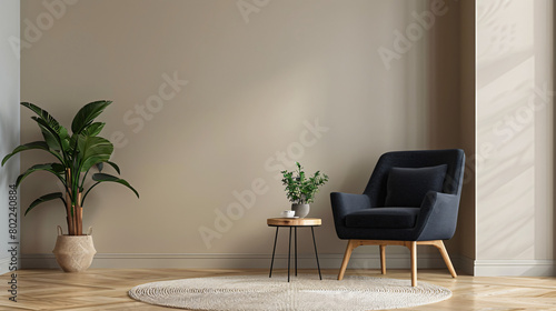 Dark grey armchair with small coffee table houseplant