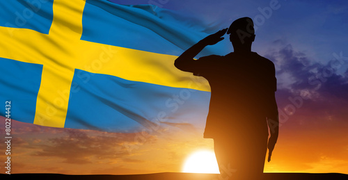 Silhouettes of soldiers with the Sweden flag on the sunset background. Concept of national holidays. Commemoration Day. 3d illustration.