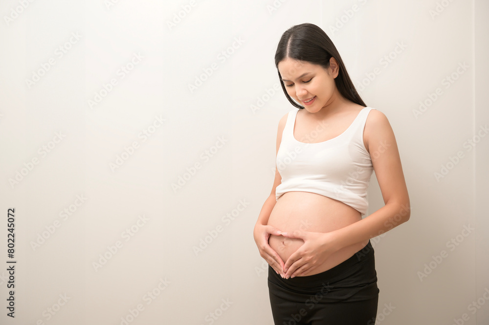 Portrait of Beautiful pregnant woman, fertility infertility treatment, IVF, future maternity concept Portrait of Beautiful pregnant woman, fertility infertility treatment, IVF, future maternity concept