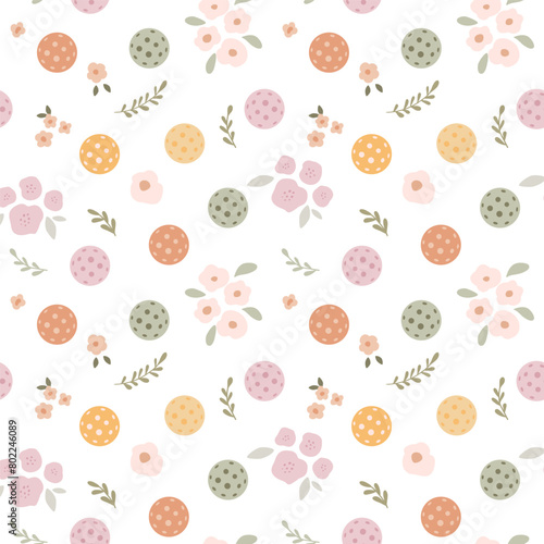 Floral pickle ball seamless pattern with balls, flowers. Vector summer game repeat background, sporty wallpaper. Female tennis print in pastel colors, textile, fabric, wrapping paper.