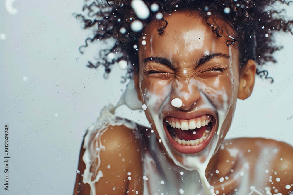 splashes of milk on the girl's skin splashes of milk on the girl's skin