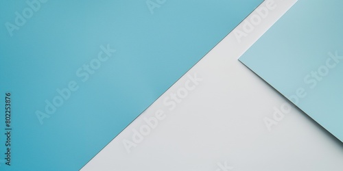 A minimalist design featuring a sharp diagonal separation between blue and white  embodying simplicity and clean lines