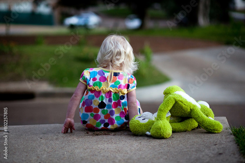 Little girl with stuffed animal