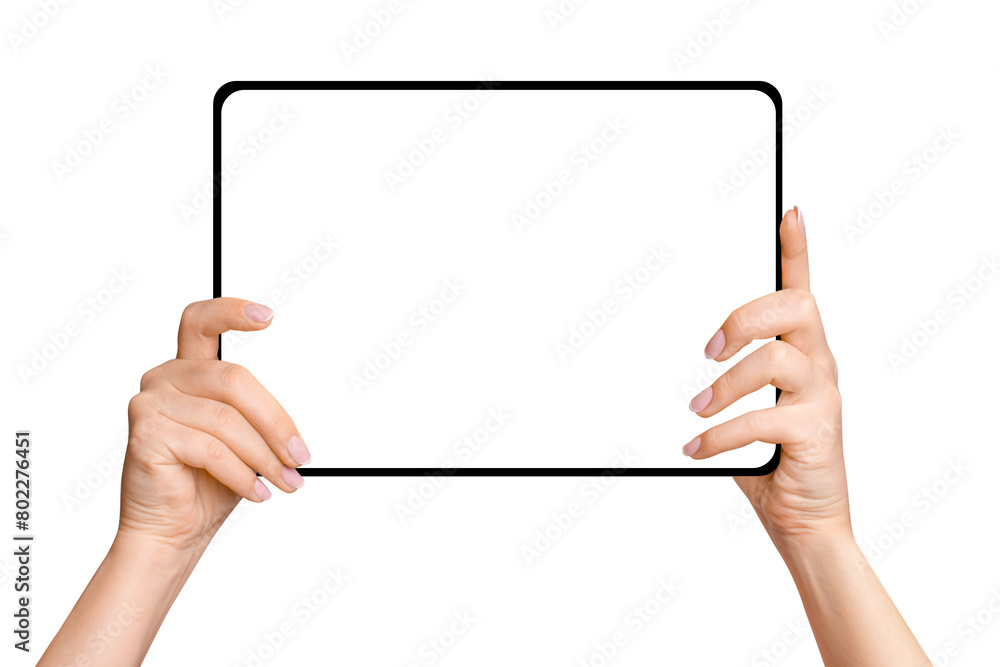 Female hands holding tablet with blank screen on empty background Female hands holding tablet with blank screen on empty background