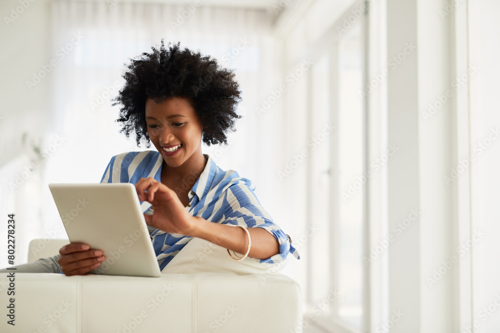 Black woman, home and happy sofa with tablet for social media post and entertainment. Female person, living room and couch on internet for streaming service or website for news update or funny videos Black woman, home and happy sofa with tablet for social media post and entertainment. Female person, living room and couch on internet for streaming service or website for news update or funny videos
