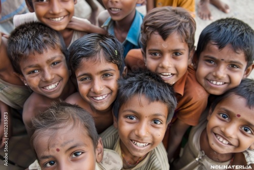 Group of indian kids smiling at the camera. Shot in India.