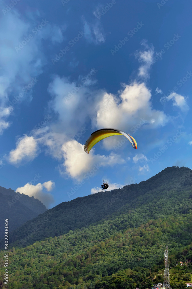 Beautiful landscape view with Paragliders in the sky at Bir Billing Himachal Pradesh. Beautiful landscape view with Paragliders in the sky at Bir Billing Himachal Pradesh.
