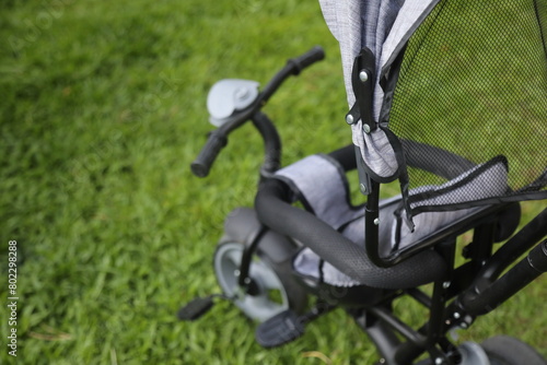Baby stroller equipped with pedals and head cover