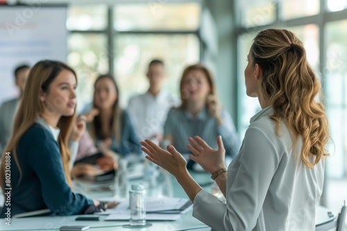 Wallpaper Mural Businesswoman gesturing in presentation Torontodigital.ca