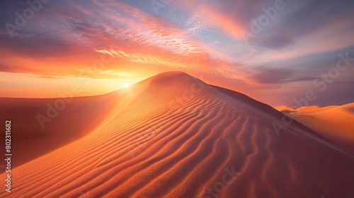 Intricate fractal patterns adorn a lone desert sand dune bathed in the warm hues of a sunrise sky