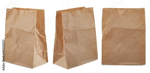 a shopping bag made of kraft brown paper isolated on a white background