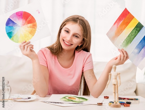 Fine girl is showing her current amazing watercolor painted rainbow collection