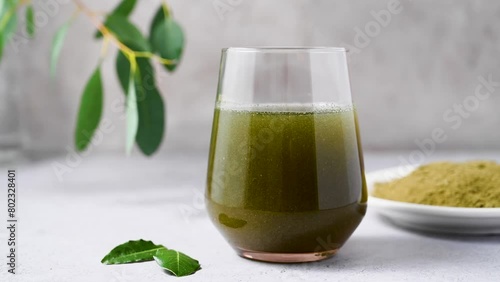 Moringa Matcha Wheatgrass Green Powder drink. Food supplement, healthy food lifesyle photo
