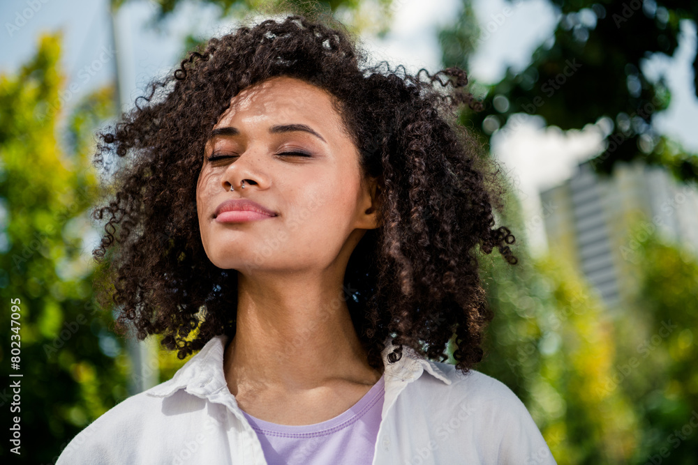 Portrait of dreamy cute pretty shiny girl with closed eyes enjoying beautiful vacation weekend trip fresh air summertime outside Portrait of dreamy cute pretty shiny girl with closed eyes enjoying beautiful vacation weekend trip fresh air summertime outside