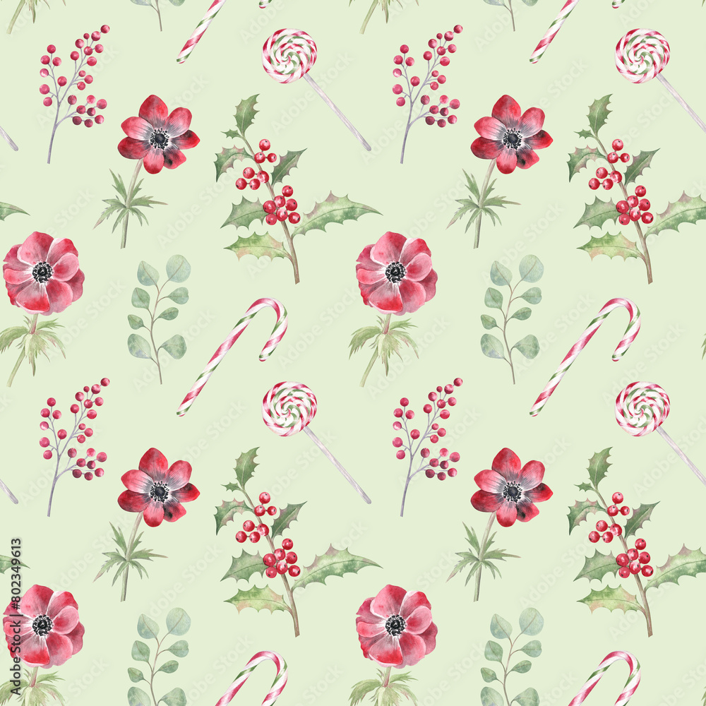 Watercolor illustration of the red anemones, winter berries, holly, and sugar canes on a light green background. Elegant Christmas seamless pattern for fabric, wrapping paper, and more