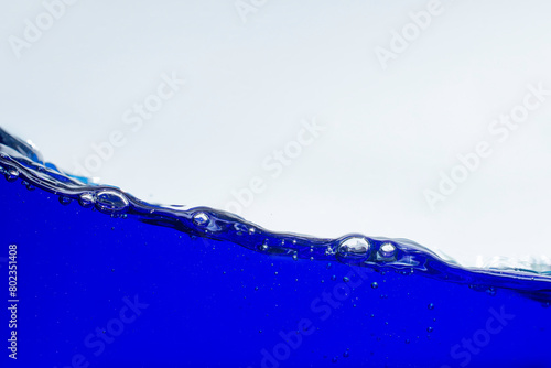 Blue water waves and air bubbles