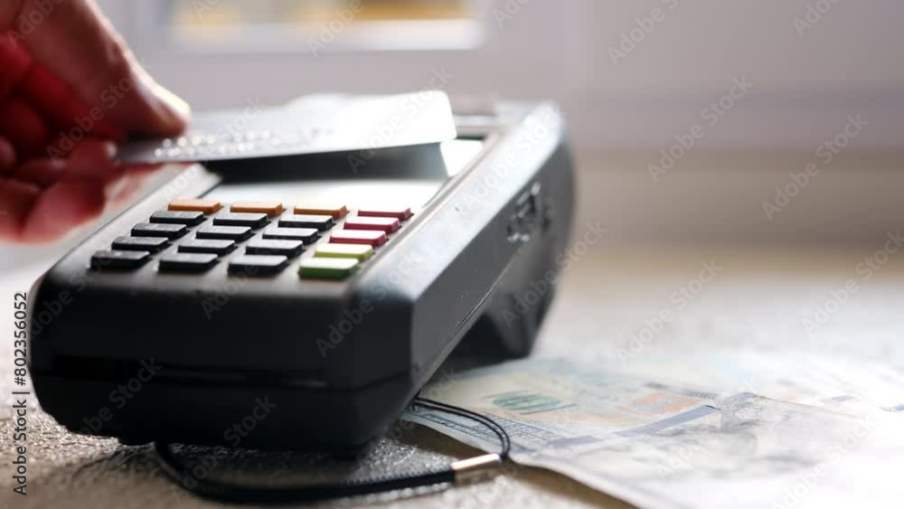Contactless scanning of the credit card into the POS machine and ...