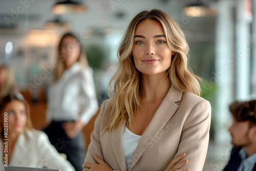 portrait of Smiling Young Businesswoman Confidently Standing in Office Meeting looking at camera