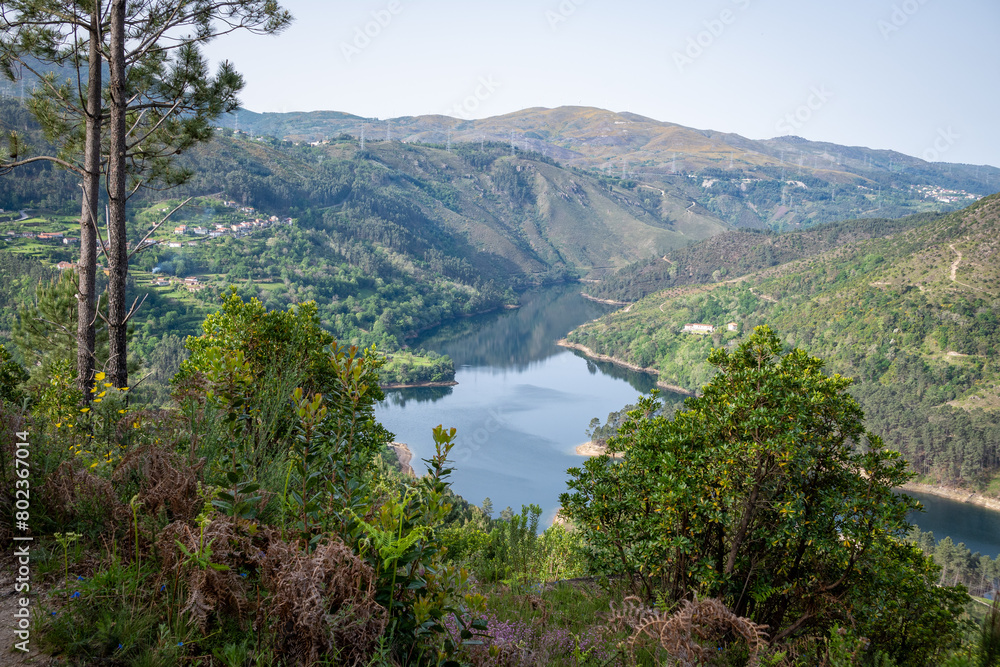 Landscape view on dammed Cávado river reservoir and village Frades, municipality of Vieira do Minho, district of Braga, Portugal
