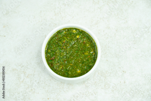 Mint and Green Chilli Sauce, Made with Tamarind Mint Coriander and Spices. Podina Chatni photo