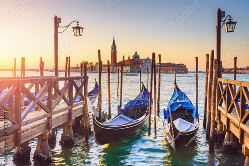 View of the gondolas of the Grand Canal bei sunrise in Venice, Italy. San Giorgio Maggiore. photo